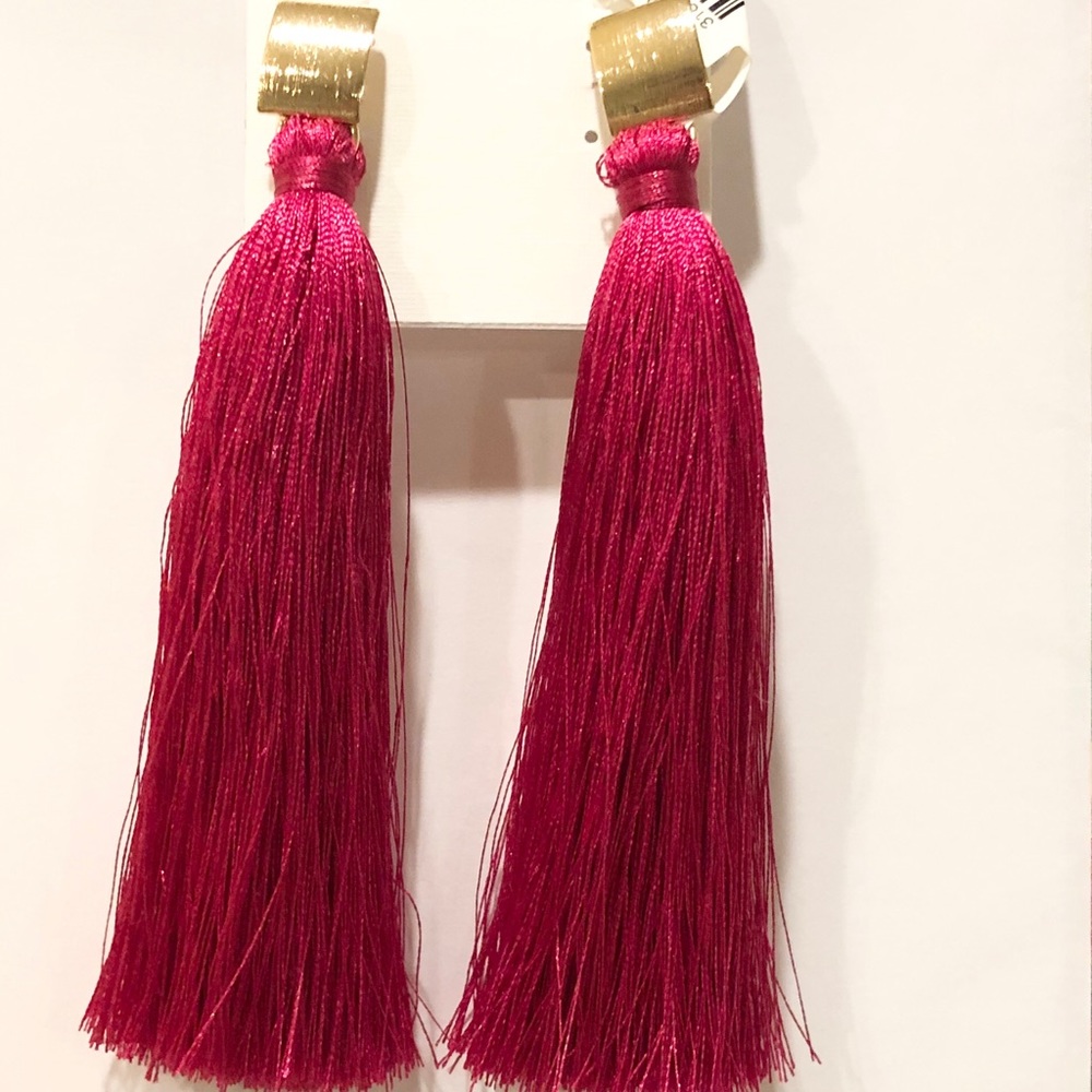 Long fuchsia color tassel earrings